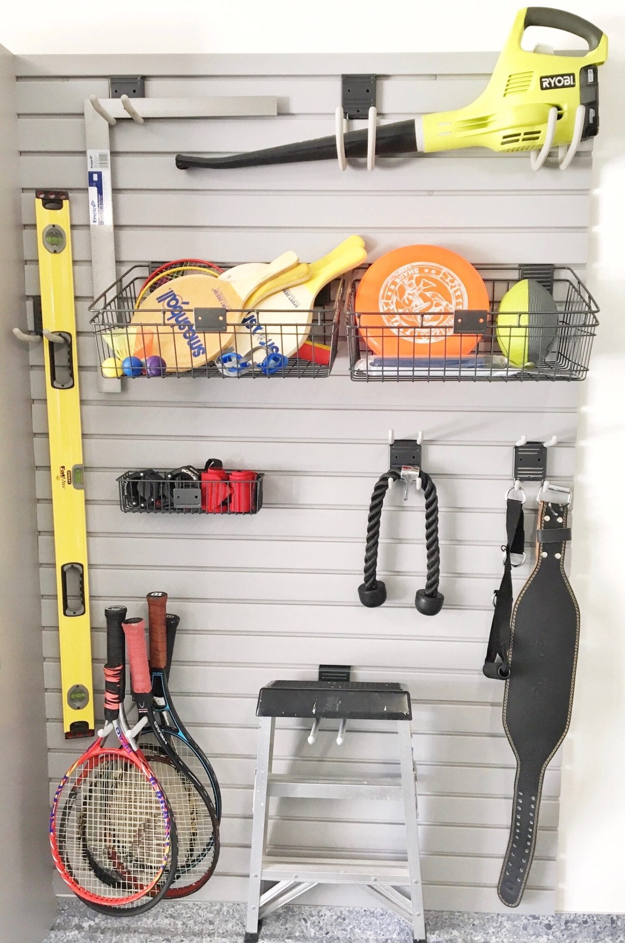 garage home organization of tools and sports gear with storage rack system professional organizer help